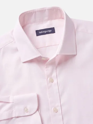 Camicia rosa pallido con puntini facili da stirare